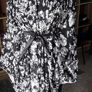 Black Flowery Chiffon Jacket with a plain Black Belt. Size: 16.